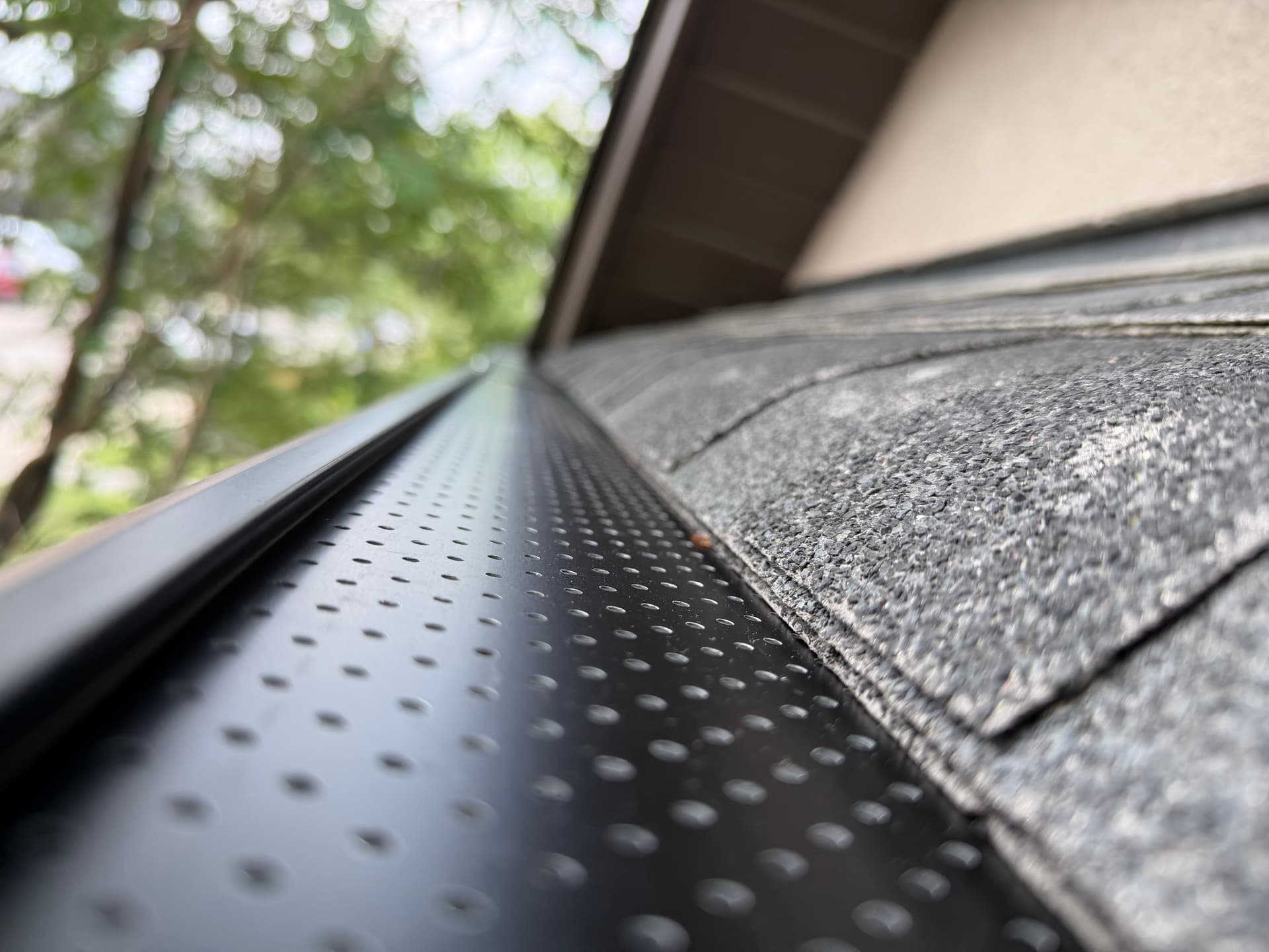 Eavestrough Resloping and Leaf Guard Installation in Northwest Calgary